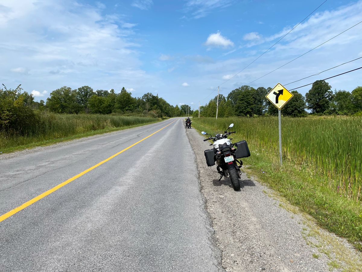 My BMW F700GS pulled over along the side of a long country road in Canada